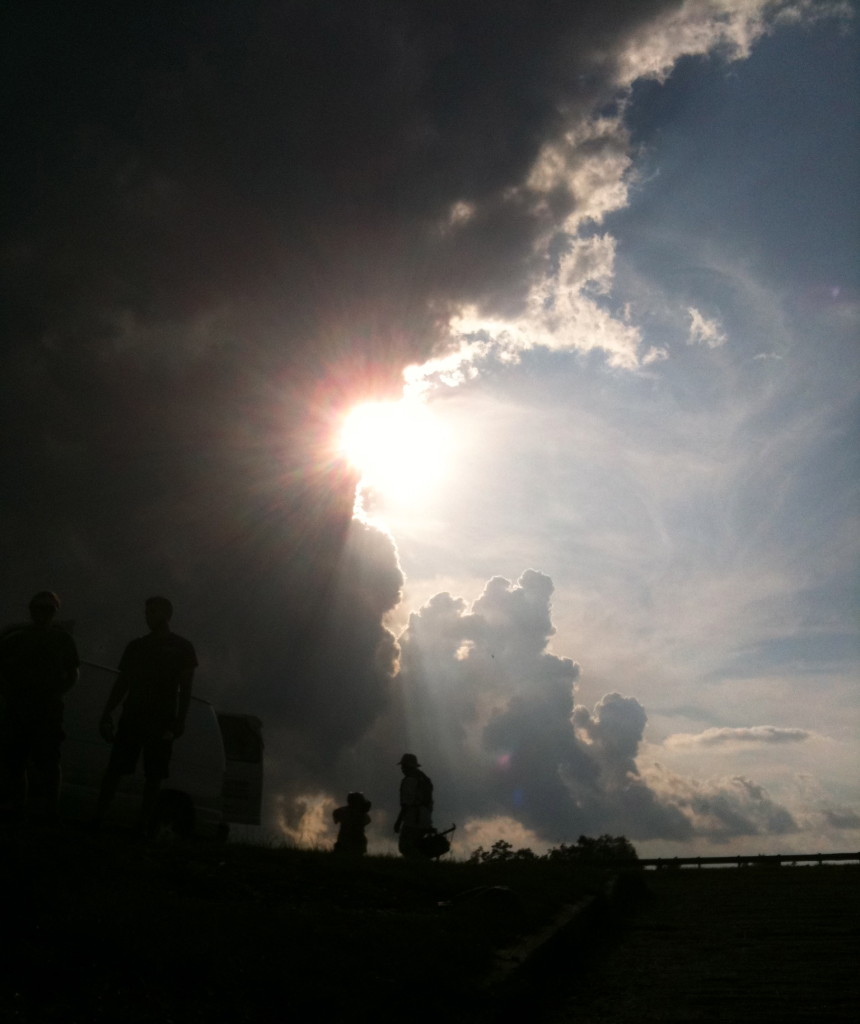 Sun bursting through clouds