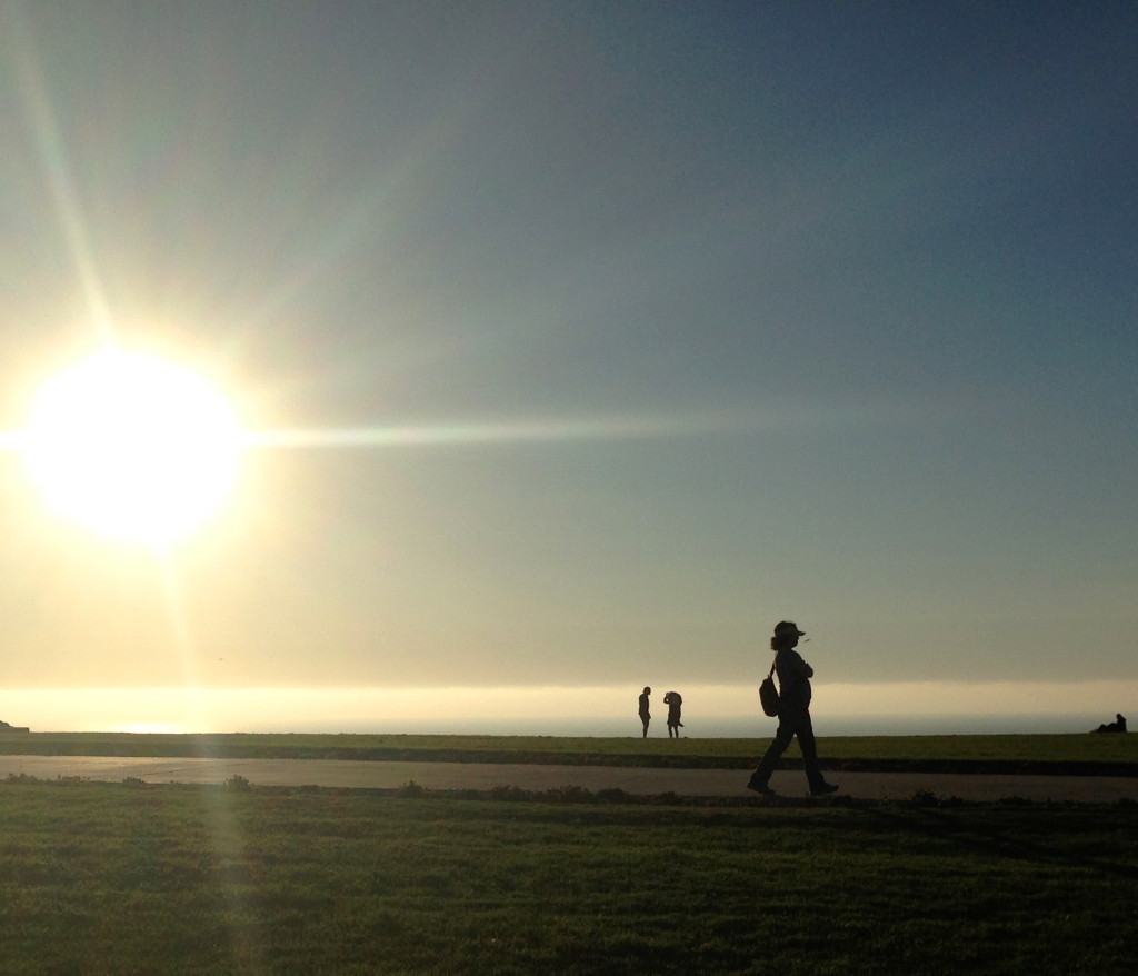 Sunset with shadow of a walker